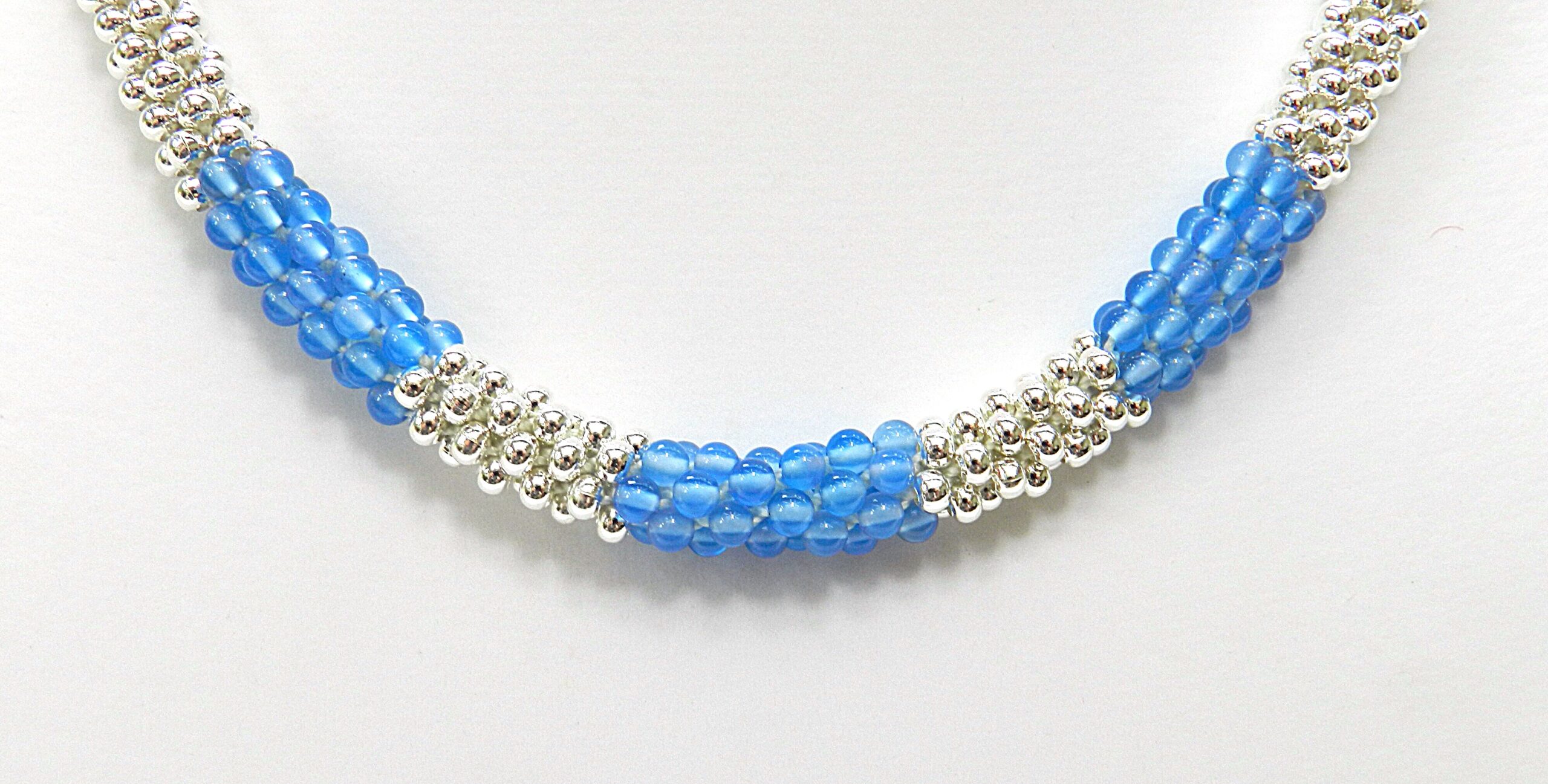 kumihimo necklace with metal seed beads and blue agate